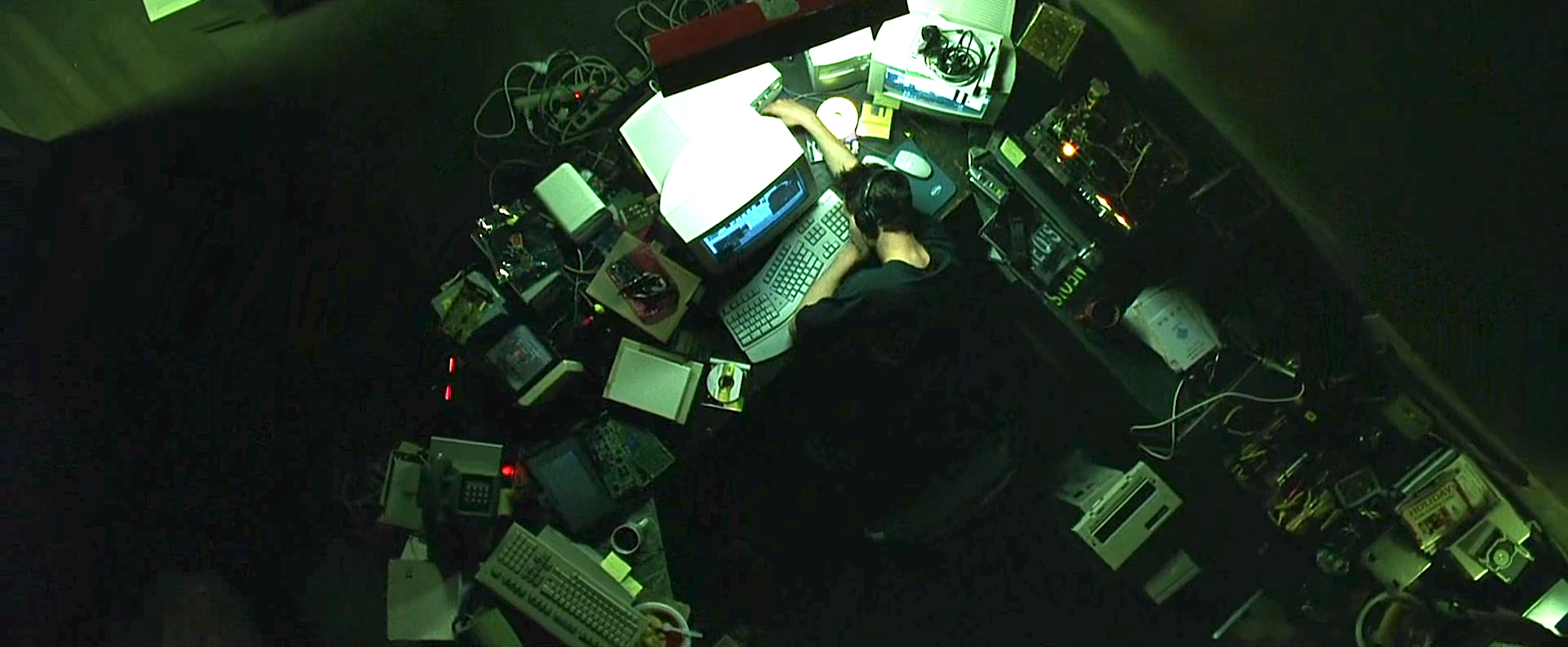a scene from the matrix where neo is first contacted through the terminal